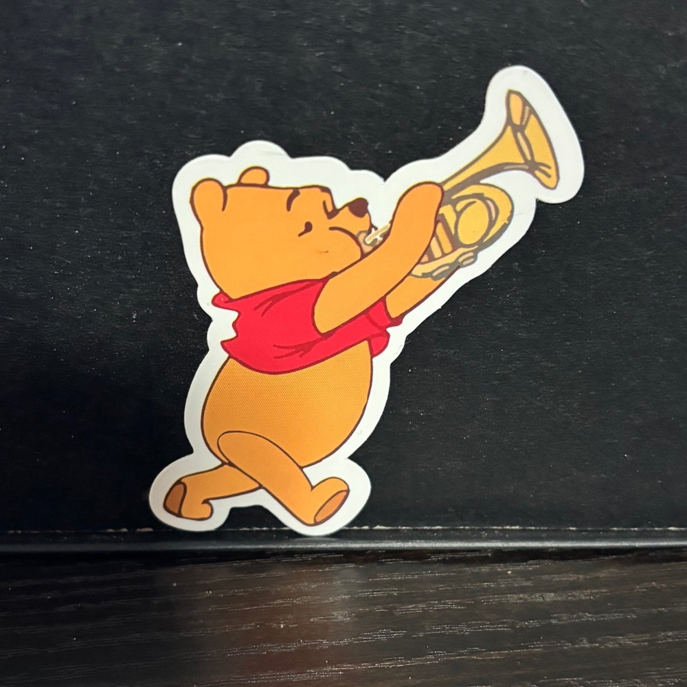 Winnie the Pooh playing the trumpet sticker
